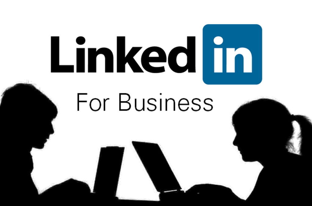 LinkedIn for Business with two people on laptops